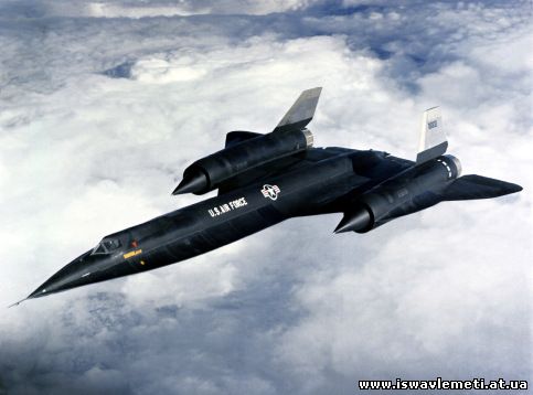 An air-to-air left front view of a YF-12 aircraft.